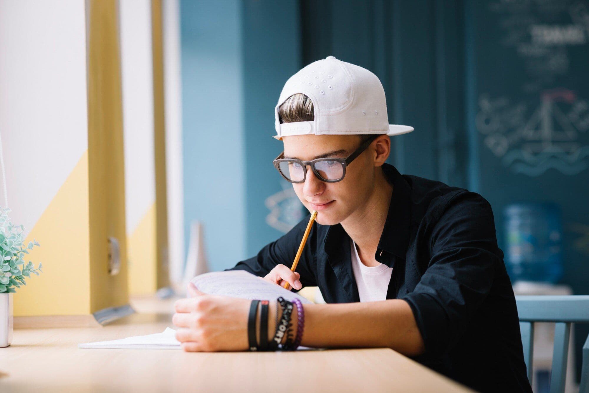 pensive-student-working-homework_23-2147666798